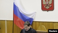 Judge Viktor Danilkin read the guilty verdict in the Khodorkovsky case to the court last December. 