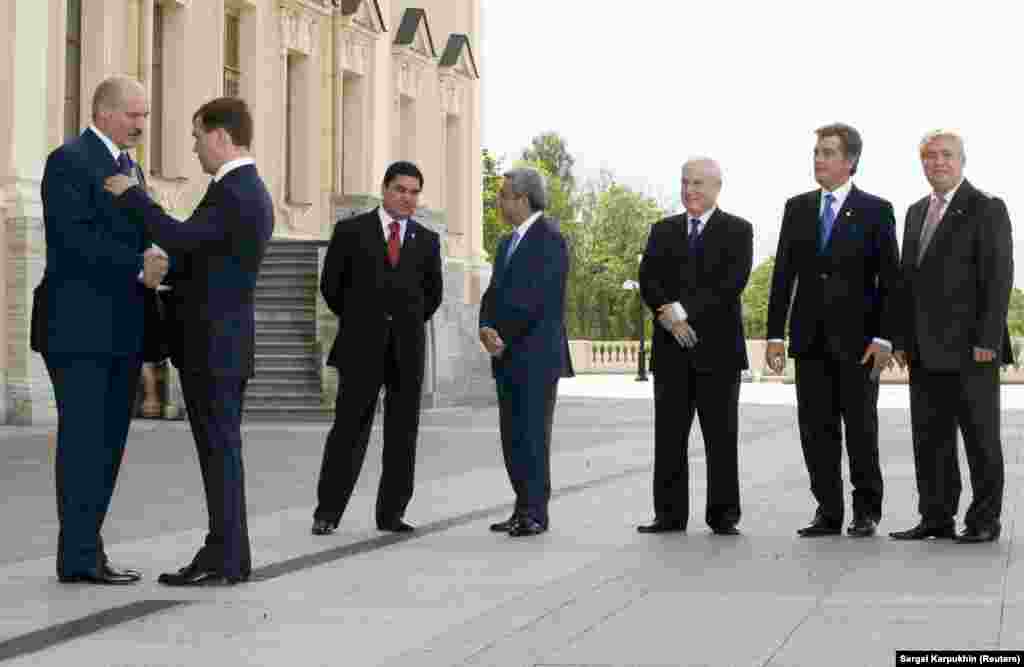 Medvedev talks with his Belarusian counterpart, Alyaksandr Lukashenka, at a meeting in St. Petersburg of leaders of ex-Soviet states on June 6, 2008.
