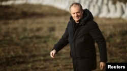 Polish PM Donald Tusk visits a portion of his country's tense border with Kaliningrad on November 30.
