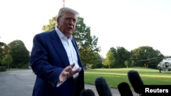US President Donald Trump speaks with reporters before departing for the NATO summit in the Netherlands.
