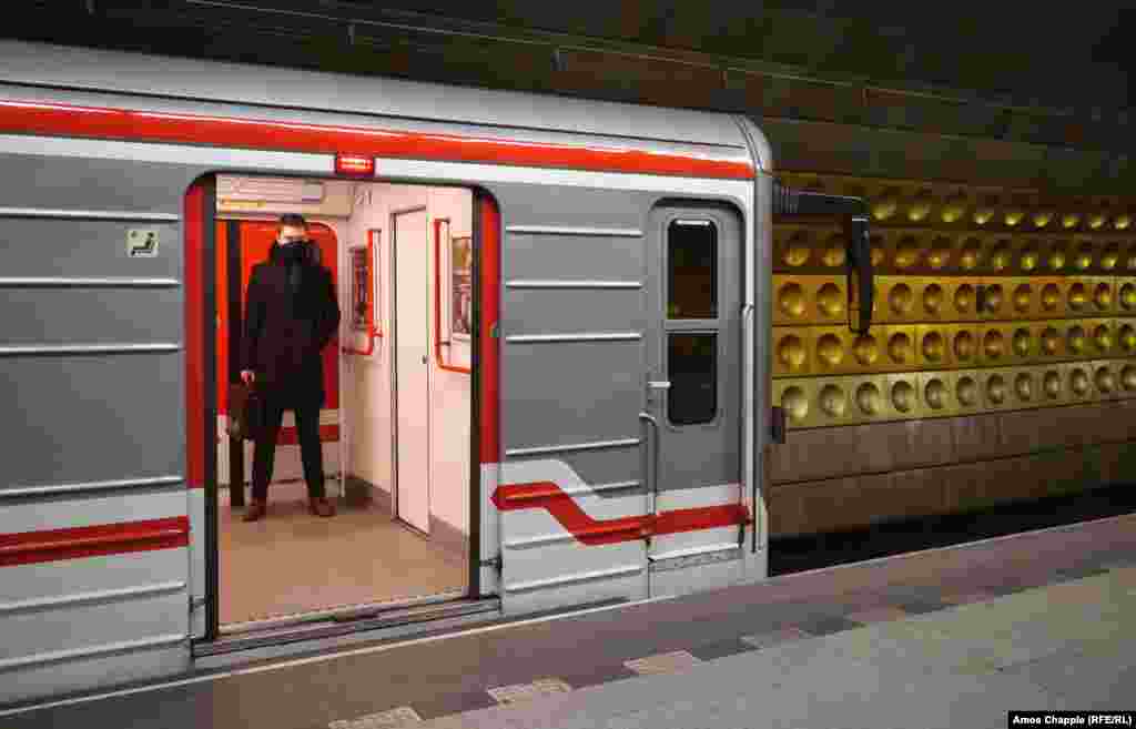 A man in a nearly empty subway car on March 17 in a station near Prague's tourist center. 
