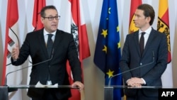 Austrian Chancellor Sebastian Kurz (right) after the resignation of his vice chancellor and coalition partner, Heinz-Christian Strache (left).