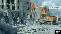 Syrian TV shows rescue work at the scene of a blast in the city of Aleppo on February 10.