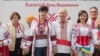 Moldova – Men and Women in national costumes at the International Day of Embroideries on May 19, 2016 in Chisinau, Moldova. May 19, 2016