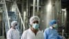 Tehran Cooperating 'Just Enough' To Avoid Sanctions