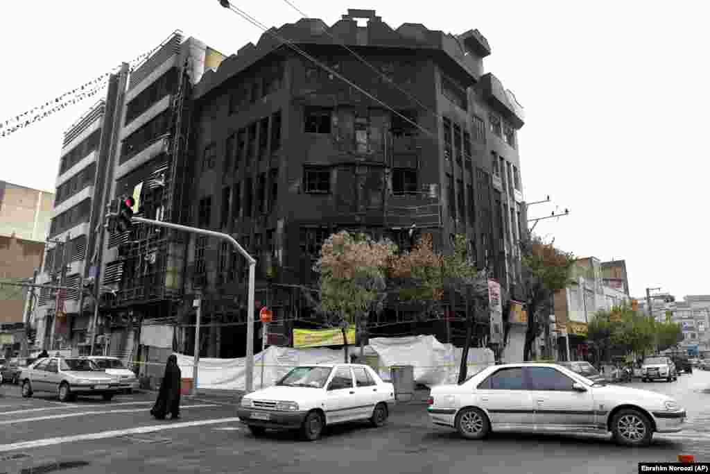 A building in Tehran that was gutted by fire during protests which erupted across Iran after the government announced it would cut subsidies to gasoline on November 15, leading to dramatic increases in prices. 