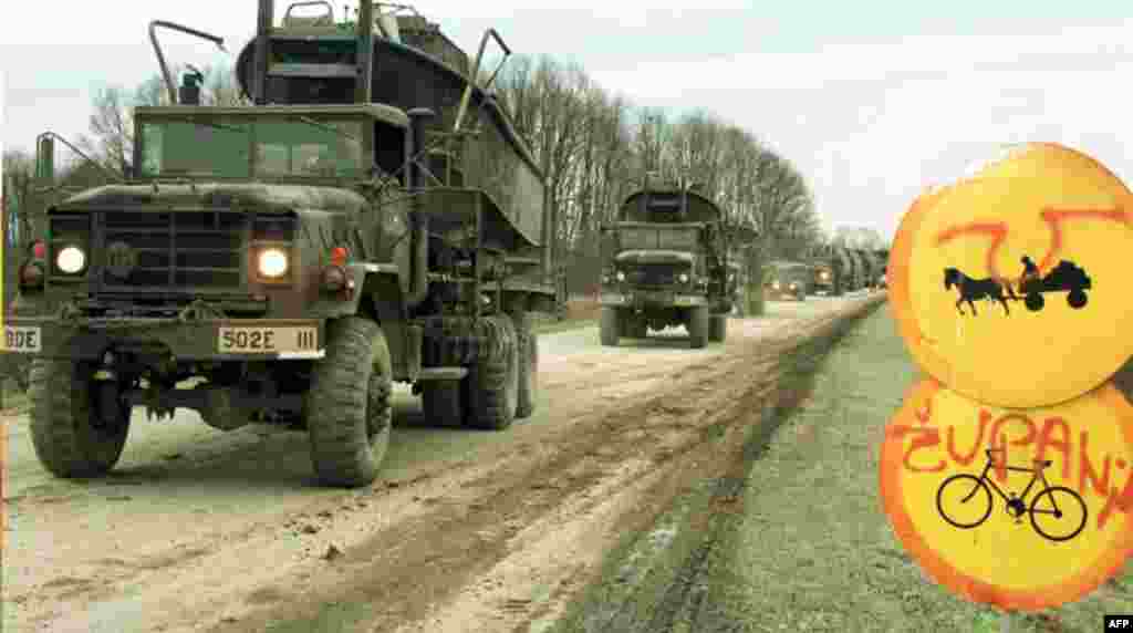 A convoy from the First U.S. Army carries boats and pontoons to Slavonski Brod on December 13, 1995. As part of the Dayton peace agreement they will construct a bridge across the Sava River that will link Bosnia and Croatia. 