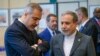 Iranski ministar vanjskih poslova Abbas Aragchi (desno) razgovara sa svojim turskim kolegom Hakanom Fidanom u junu. 